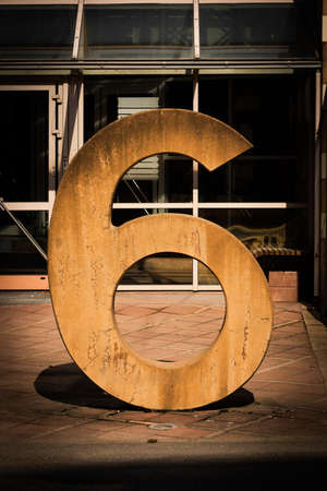 A large number six in concrete.の写真素材
