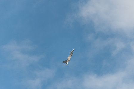 Gothenburg, Sweden - August 29 2010: Danish Air Force F-16 airplane sweeping across the sky.