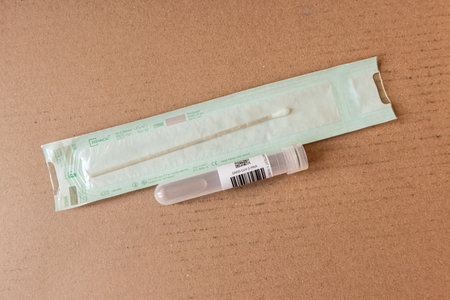 Gothenburg, Sweden - October 28 2020: COVID-19 self test kit containing a swab and a tube.のeditorial素材