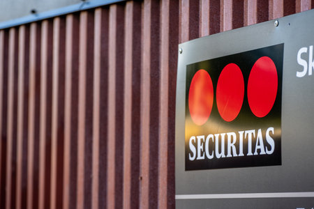 Gothenburg, Sweden - July 28 2022: Securitas logo on the wall of a garageのeditorial素材