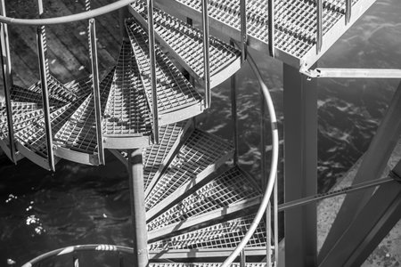 Black and white details of a circular stairs