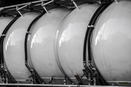 MalmÃ¶, Sweden - July 09 2022: Trailer with white grain tanks ready to be filledのeditorial素材