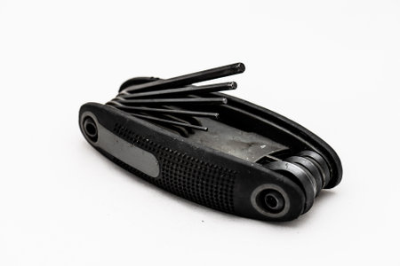 Grey hex key tool on white background