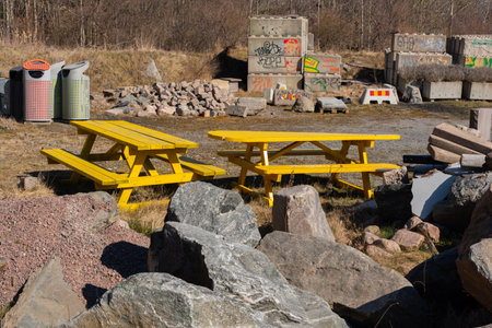 Gothenburg, Sweden - March 30 2022: Yellow wooden benches in storage