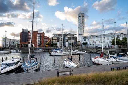 MalmÃ¶, Sweden - July 09 2022: Marina at VÃ¤stra Hamnen with Turning Torso in the backgroundのeditorial素材