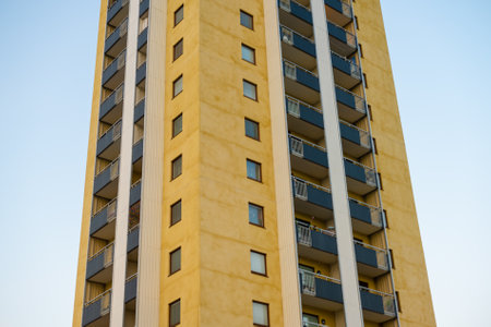 Tall yellow apartment high rise