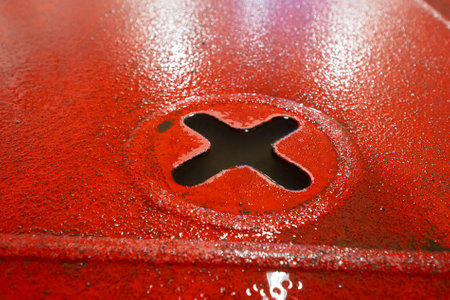 X shaped strap fastening point on a ferry deck for securing vehicles and cargo
