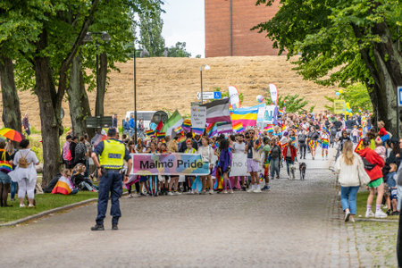 MalmÃ¶, Sweden - July 09 2022: Main parade of MalmÃ¶ Pride filled with rainbow flagsのeditorial素材