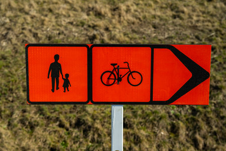 Temporary sign showing alternate route for pedestrians and bicyclistsの写真素材