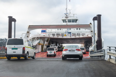 Moss, Norway - April 07 2023: Cars embarking ferry at Mossのeditorial素材