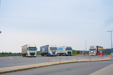 Lillesand, Norway - April 10 2023: Lorries parked by a rest stop