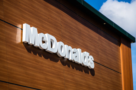 Stathelle, Norway - April 07 2023: McDonalds logo on the facade of a buildingのeditorial素材