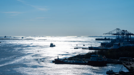 Gothenburg, Sweden - April 20 2023: Ship departing port of Gothenburg in sunset light