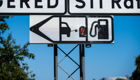 Gothenburg, Sweden - June 07 2023: Sign pointing the way to electric car chagerのeditorial素材