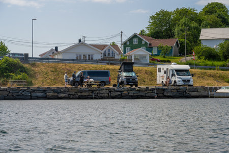 Lindesnes, Norway - June 22 2023: Recreational vans parked on a pierのeditorial素材