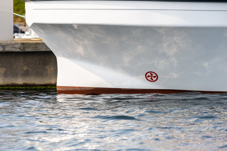 Bow of a compact plastick fishing trawler with bow propellerの写真素材