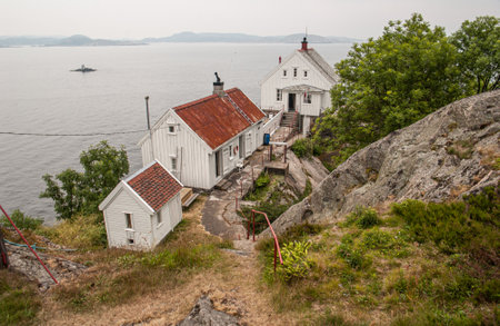 Lindesnes, Norway - July 06 2006: Buildings at Hatholmen lighthouse outside Mandal.のeditorial素材