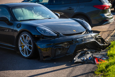 Gothenburg, Sweden - October 08 2023: Damaged front of a Porsche 718 GT4 sports carのeditorial素材