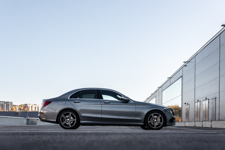 Gothenburg, Sweden - October 23 2021: Side view of a grey Mercedes Benz C-class car on a rooftop...