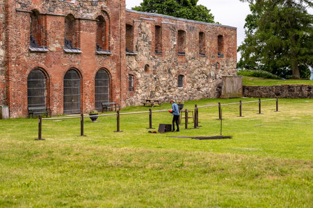 Alingsas, Sweden - July 01 2022: Rigging up for a medieval tournament at Gr?fsn?s slottsruin.のeditorial素材