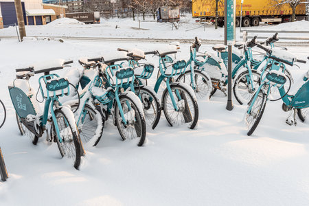 Gothenburg, Sweden - december 04 2021: Bikes for hire from Styr och St?ll in deep snow.
