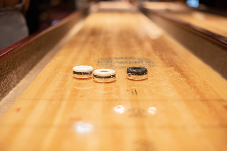 Playing the game of shuflleboard.