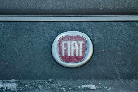 Gothenburg, Sweden - January 06 2024: Fiat car logo with ice on a carのeditorial素材