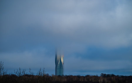 Gothenburg, Sweden - February 20 2024: Low clouds obscuring the upper floors of Karlatornet high...