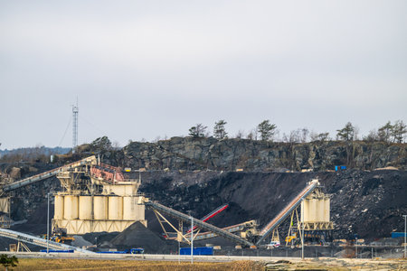 Gothenburg, Sweden - February 20 2024: Stone quarry machinery crossing and sorting rockのeditorial素材