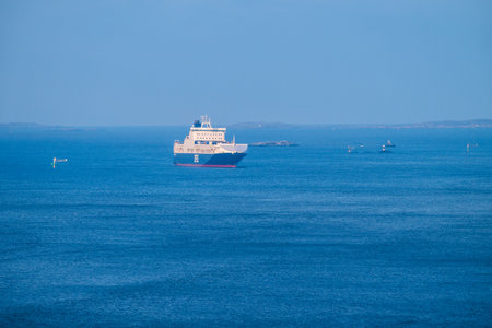 Gothenburg, Sweden - March 05 2024: Transport ferry arriving Gothenburg in the morningのeditorial素材