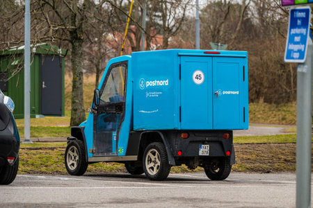 Gothenburg, Sweden - March 01 2024: Small blue Postnord delivery vehicleのeditorial素材
