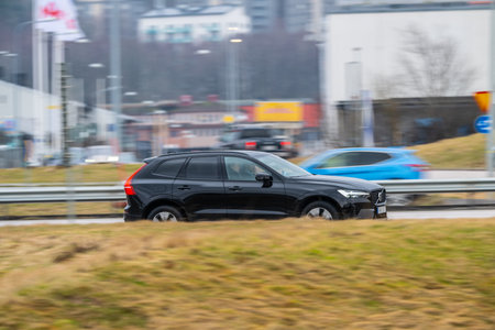Gothenburg, Sweden - March 01 2024: Black Volvo  on a highwayのeditorial素材