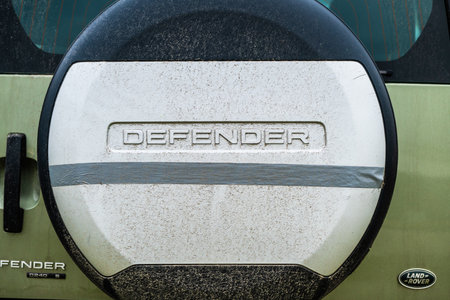 Gothenburg, Sweden - March 01 2024: Spare wheel cover of a dirty Land Rover Defenderのeditorial素材