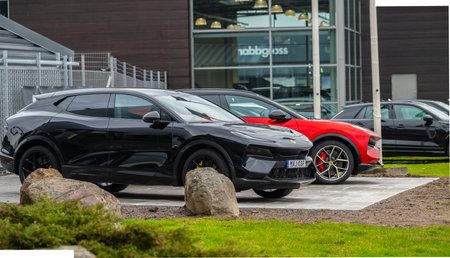 Gothenburg, Sweden - March 01 2024: Black and red 2024 Lotus Eletre electric SUV cars on displayのeditorial素材