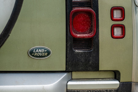 Gothenburg, Sweden - March 01 2024: Rear lights and badge of a Land Rover Defenderのeditorial素材
