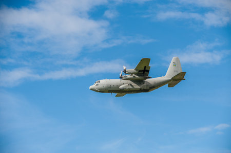 Gothenburg, Sweden - August 29 2010: Lockheed Martin C-130 Hercules operated by the Swedish Air Force performing a flyoverのeditorial素材
