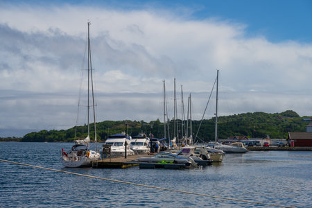 Farsund, Norway - July 02 2023: Boats at a marina in summerのeditorial素材
