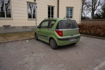 Uppsala, Sweden - March 10 2024: Green 2005 Peugeot 1007 small car at a parking lotのeditorial素材