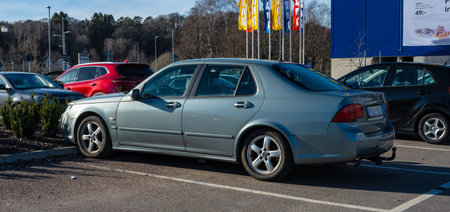 M?lndal, Sweden - March 17 2024: Grey 2009 SAAB 9-5 at a parking lotのeditorial素材