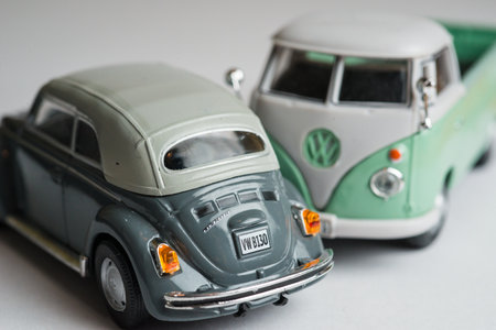 Gothenburg, Sweden - January 07 2013: Scale model of a dark green Volkswagen Beetle cabriolet and a Transporterのeditorial素材