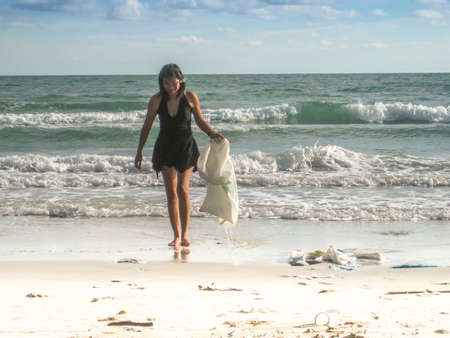 Lady clean beach in islandの写真素材