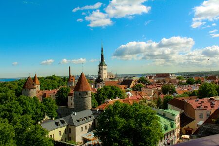 Tallinn city view from hill with blue sky and white cloudsの写真素材