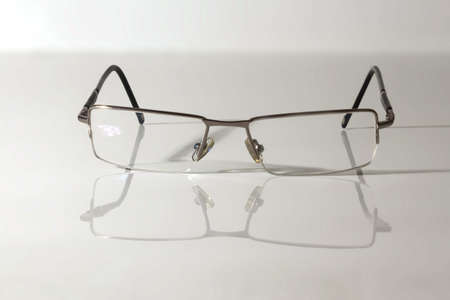 Glasses on reflective surface