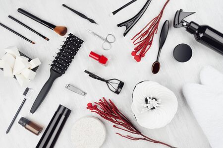Black beauty products, accessories for makeup, manicure - brushes, sponges, buds, pads, towel, red...