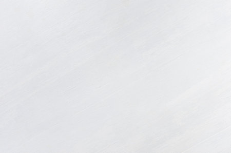 White wooden painted board with diagonal planks, top view, texture.の写真素材