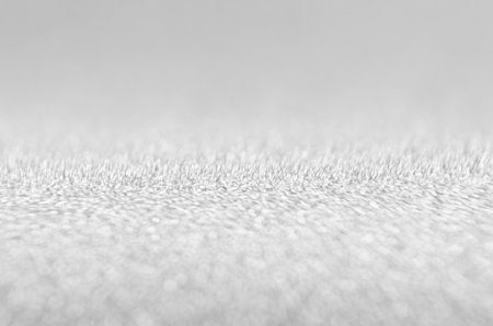 Rich white sparkle bokeh texture as festive background.の写真素材