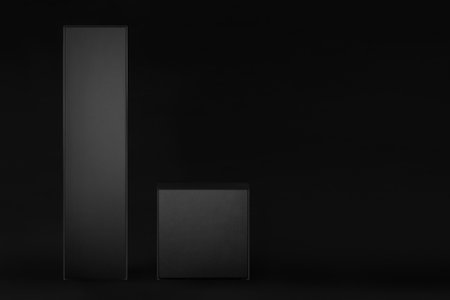 Collection of rectangle tall, square black paper boxes, front view on black background, mock up...