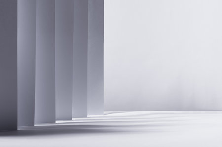 Abstract white gray background with contrast perspective of stripes, light and shadow and copy space like street, city, scene.の写真素材