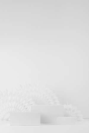Abstract scene with white three stands template in oriental style with round asian carved paper white fans, soft light delicate background for presentation, advertising, design, vertical, copy space.の写真素材