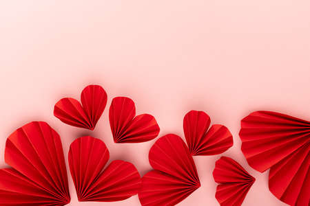 Sweet abstract love background for wedding or Valentines day with soar red paper ribbed hearts in...